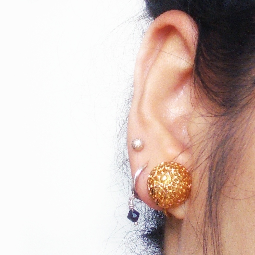 Vintage MONET gold tone ear clip on